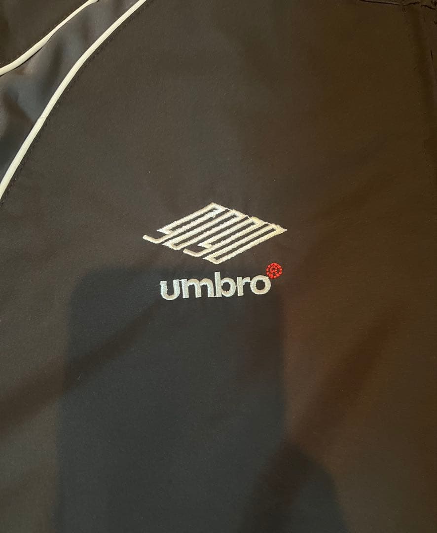 ジャケット・アウター 9090 x umbro Emblem Nylon Jacket black