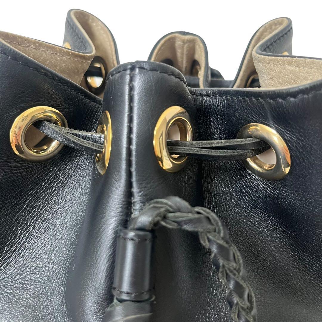 J&M DAVIDSON フリンジ　カーニバル　巾着バッグ　ワンショルダー