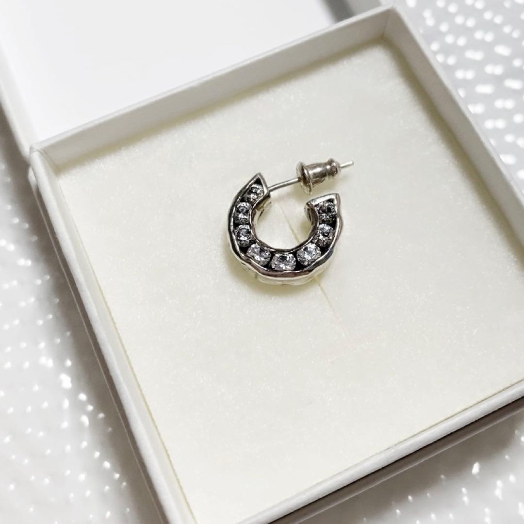 e.m. イーエム ジルコニア埋め込みフープピアス 片耳