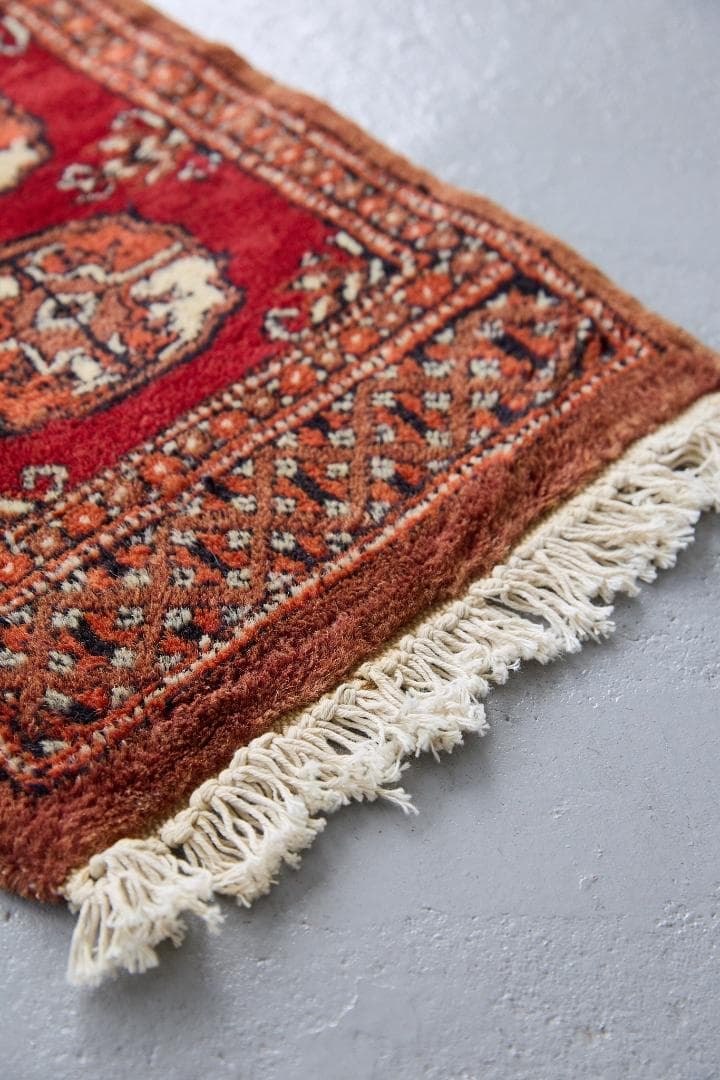 ヴィンテージラグ　トライバルラグ　パキスタン（95×33cm）赤　茶　オレンジ