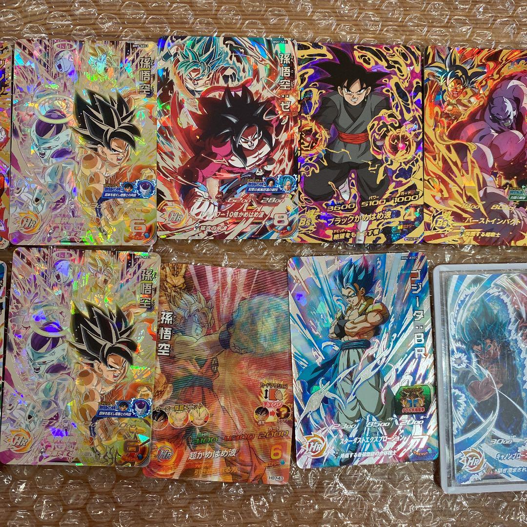 スーパードラゴンボールヒーローズ カード計16枚何円なら買いますか？