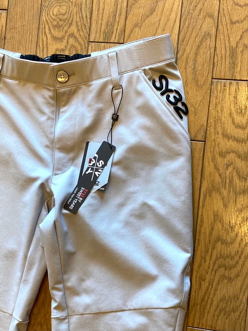 SY32ゴルフパンツ ライトグレー 新品タグ付き.新品未使用.Mサイズ