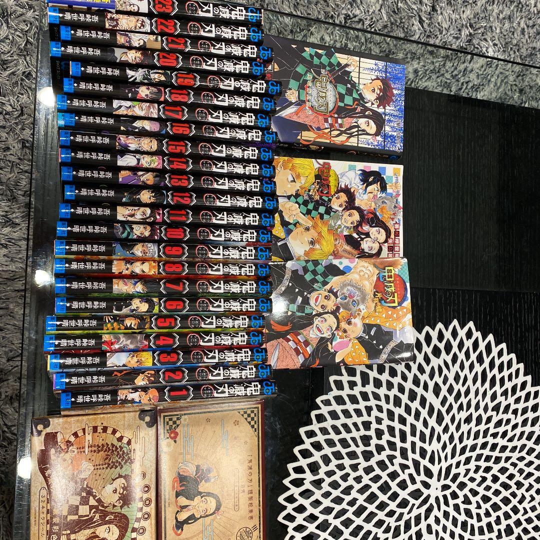 鬼滅の刃1〜23巻+小説2巻+公式ファンブック＋ポストカード＋キャラシール