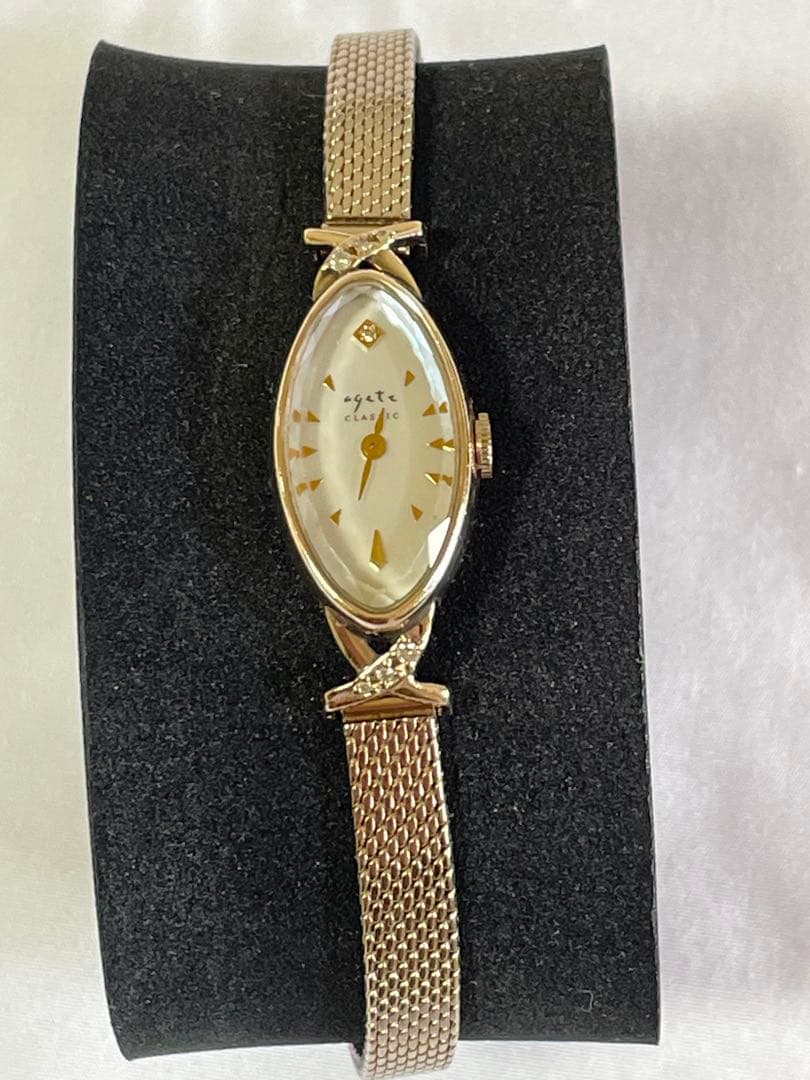 agete アガット　オーバルフェイス　ジュエリーウォッチ　ダイヤ　シェル