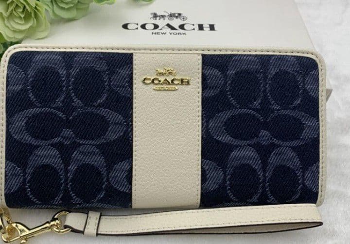 新品未使用コーチ長財布ネイビーホワイトシグネチャーレディースメンズ送料無料