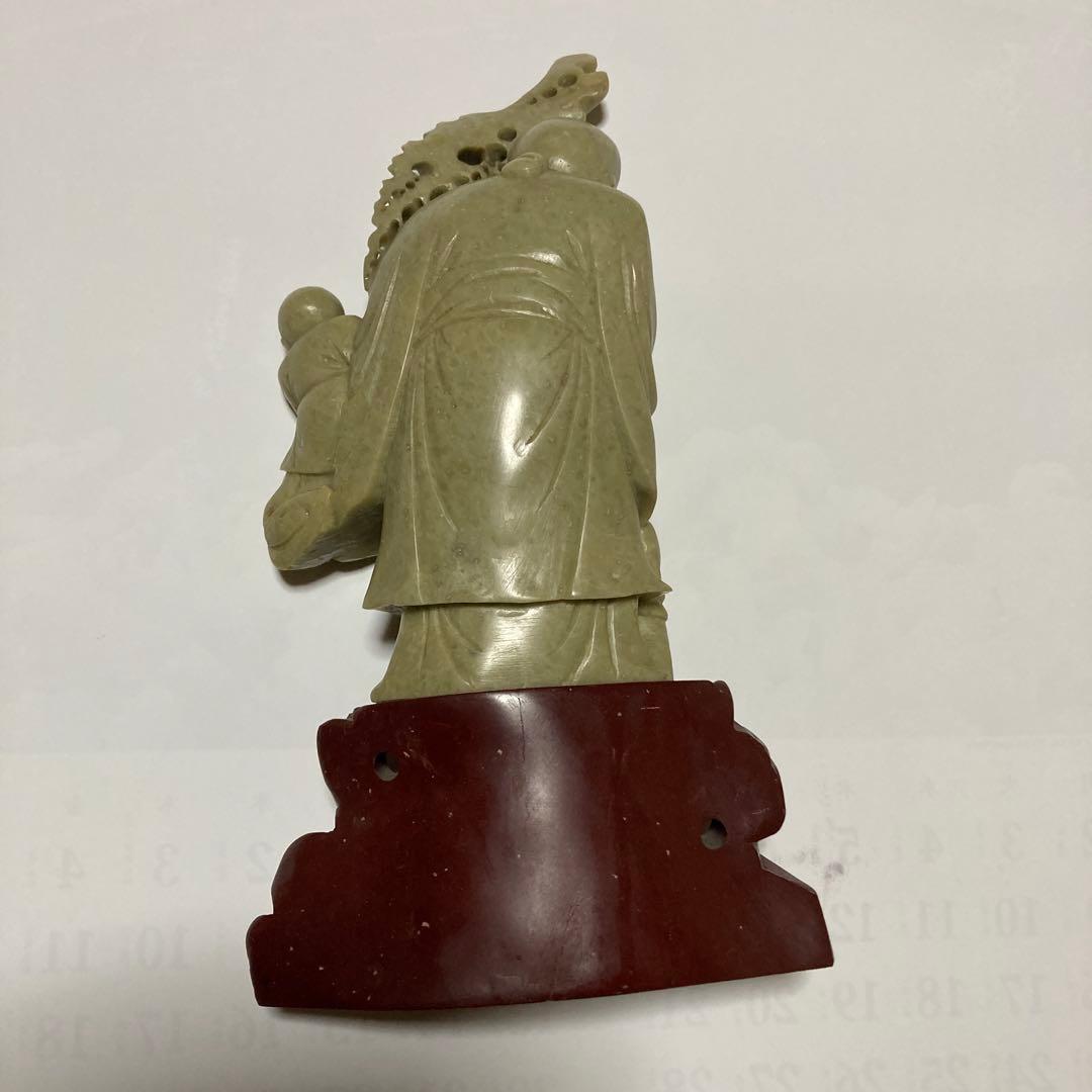 老人と子供の彫刻