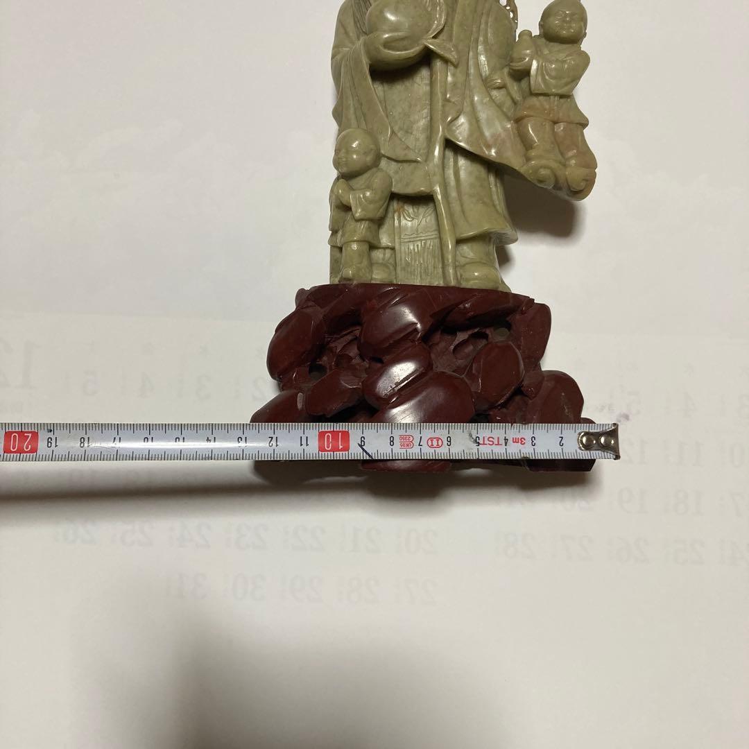 老人と子供の彫刻