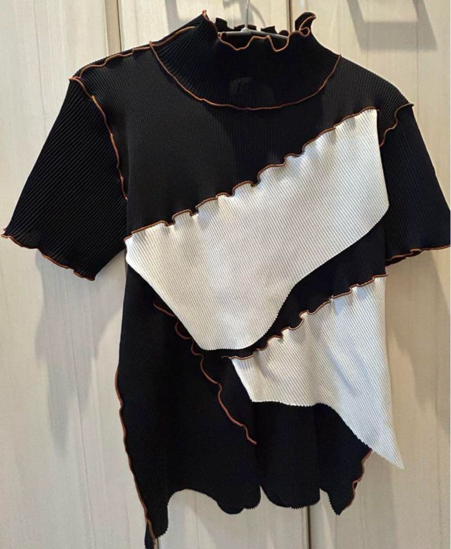 kotohayokozawa（コトハヨコザワ）　ハイネックプリーツトップス