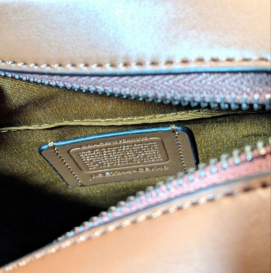 サリバン クロスボディ バッグ・シグネチャー キャンバス・スヌーピー プリント