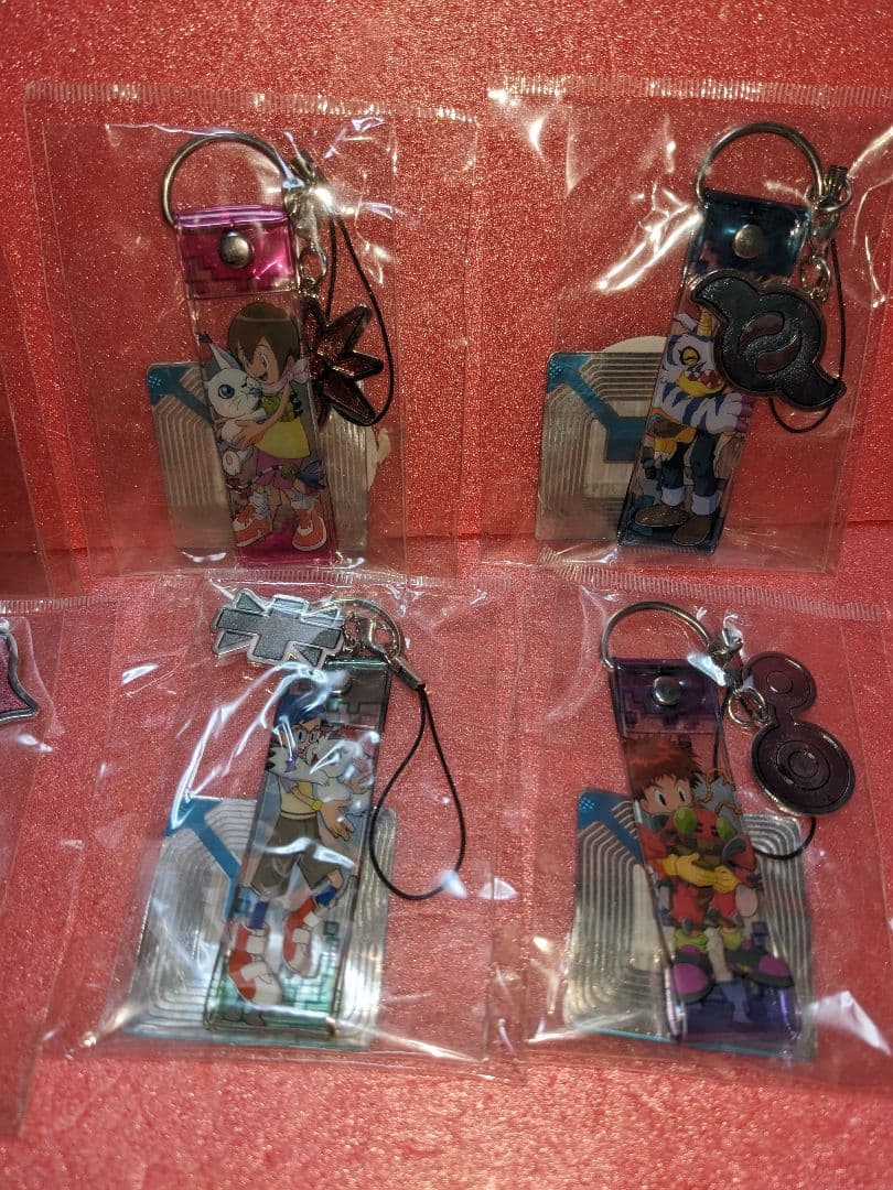 ：【デジモンアドベンチャー】グッズ「トレーディング紋章ストラップ(8個コンプ)」