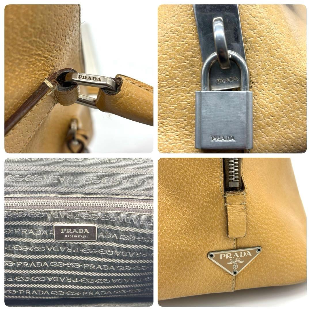 【ショッパー付】プラダ ハンドバッグ レザー 南京錠 ラウンドファスナー