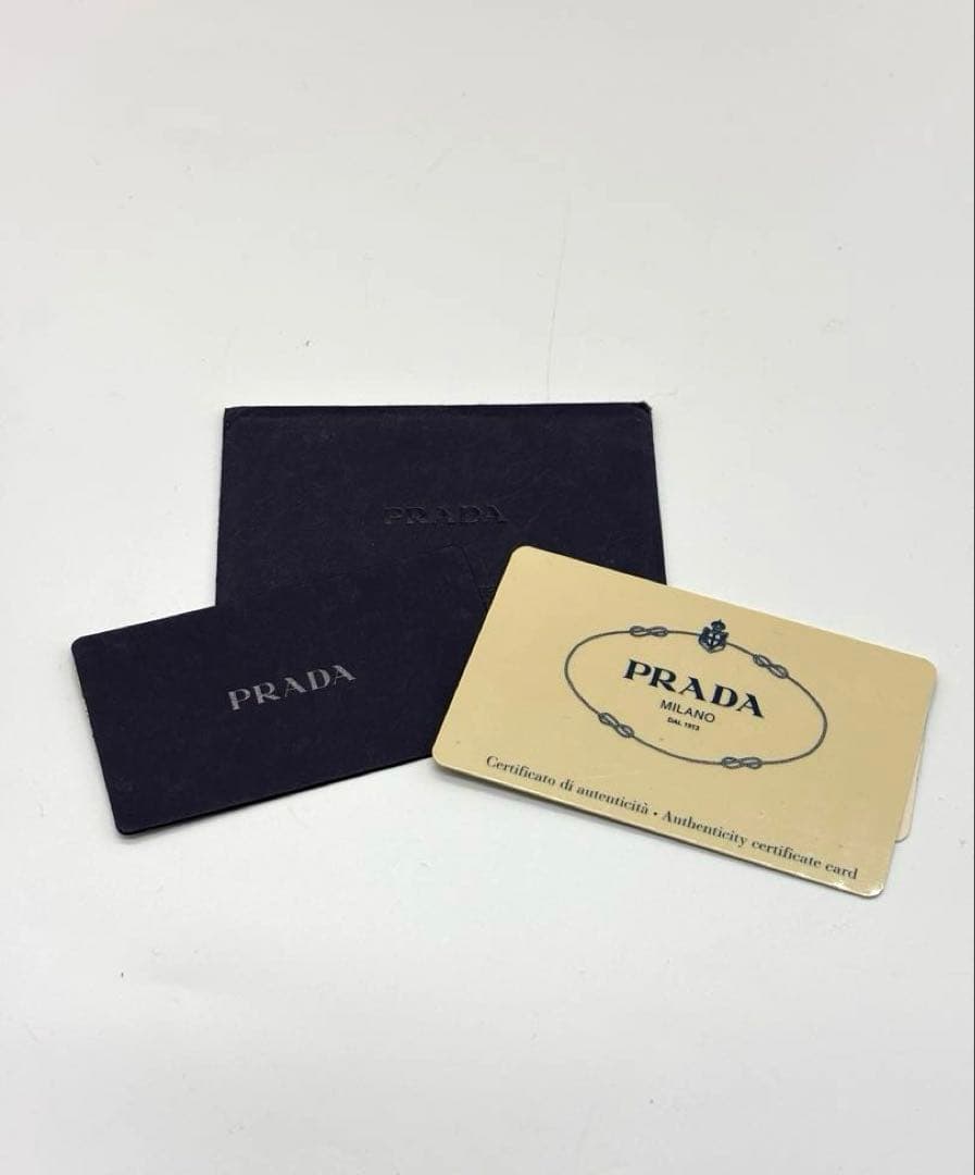 【ショッパー付】プラダ ハンドバッグ レザー 南京錠 ラウンドファスナー