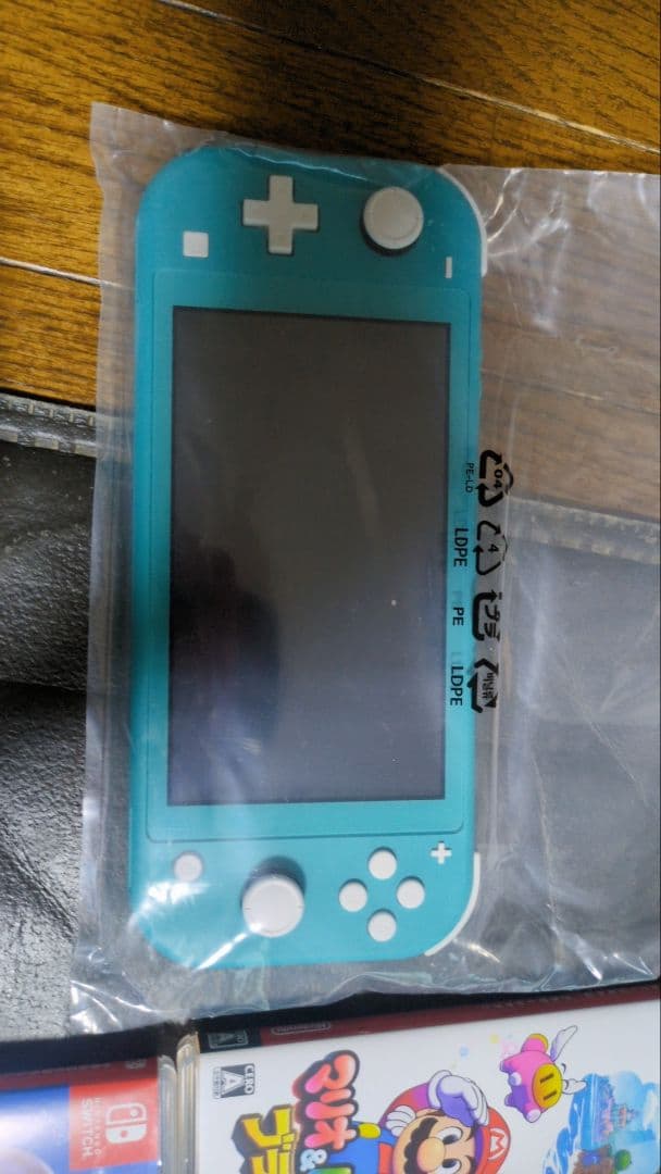 任天堂スイッチライト本体　ターコイズ　マリオ、パワフルプロ野球ソフト