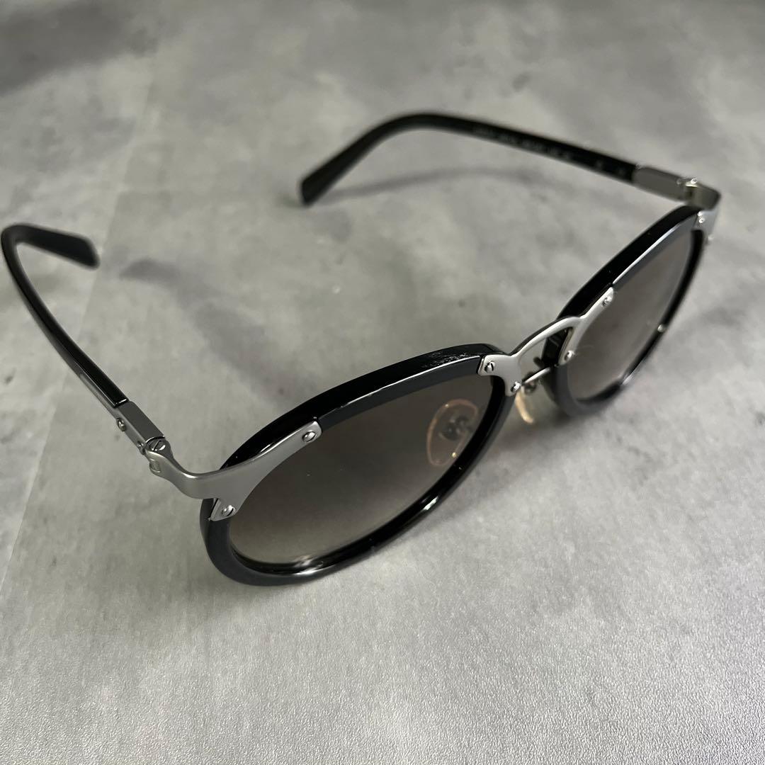PRADA（プラダ）サングラス OPR 01TS 黒　ブラック