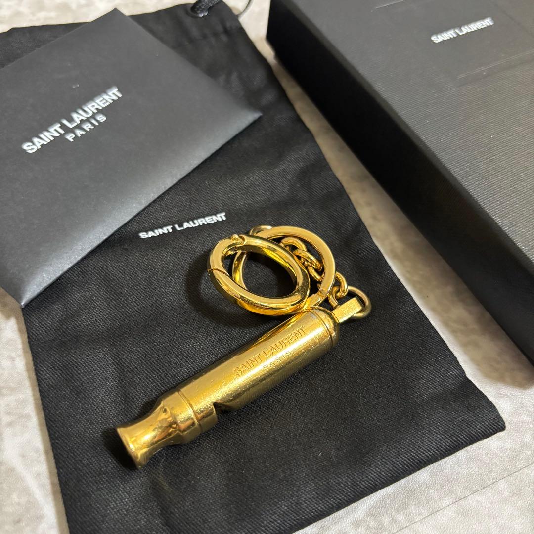 H154 良品✨サンローランパリ　キーホルダー　メタルホイッスル　笛　男女兼用