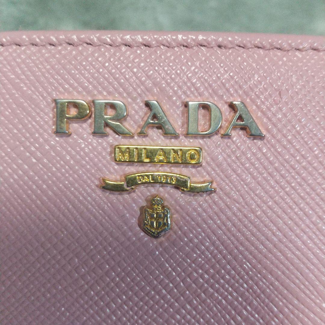 PRADA サフィアーノレザーラウンドファスナー 長財布 ピンクベージュ系