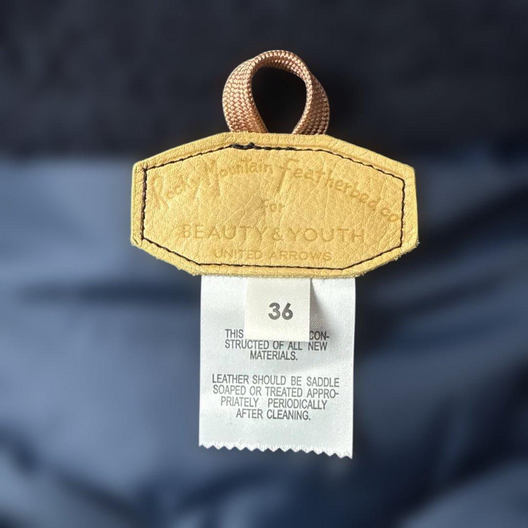 h*0様 ロッキーマウンテン　フェザーベッド レザーヨークダウンベスト ムートン