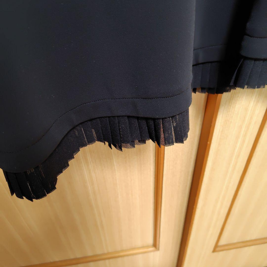 トクコプルミエヴォルの黒チュニックワンピース