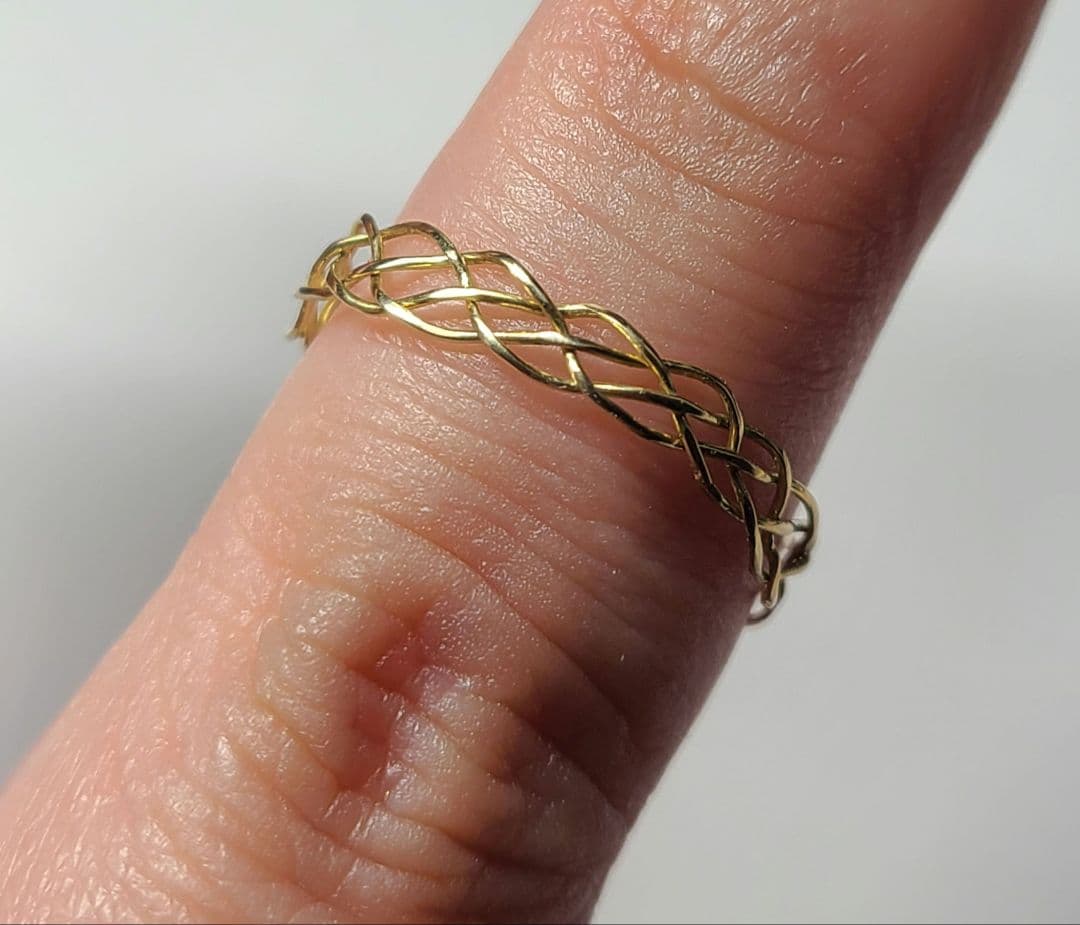 素晴らしい煌めきのリボンさん★パライバトルマリン&アウイナイト18金編み込み★