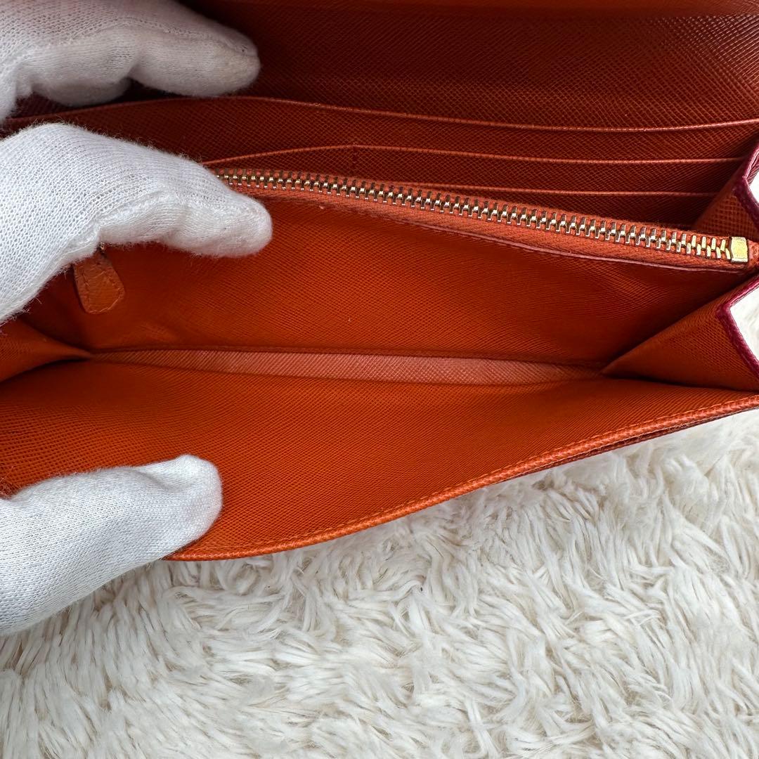 ✨美品✨プラダ　長財布　メタルロゴ　バイカラー　サフィアーノレザー　赤　オレンジ