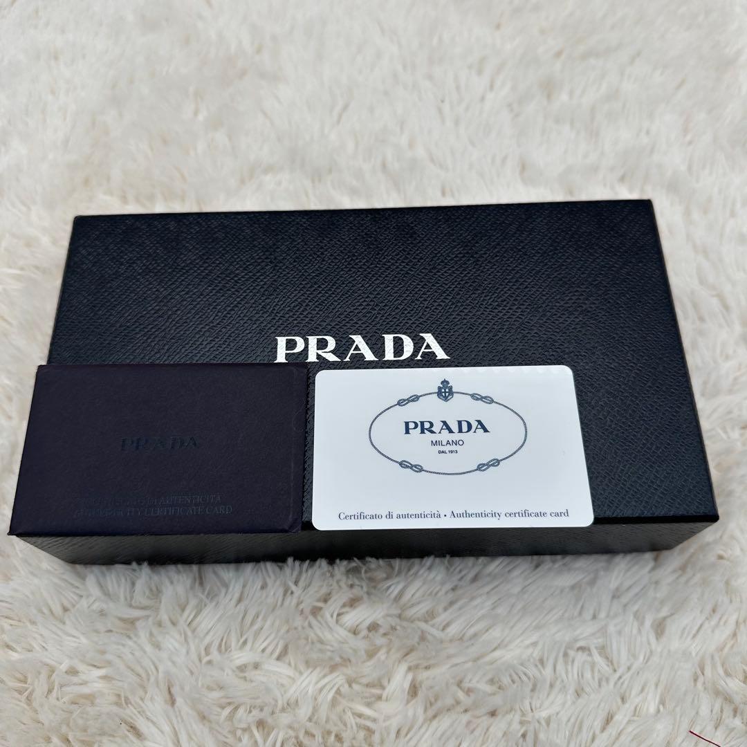 ✨美品✨プラダ　長財布　メタルロゴ　バイカラー　サフィアーノレザー　赤　オレンジ