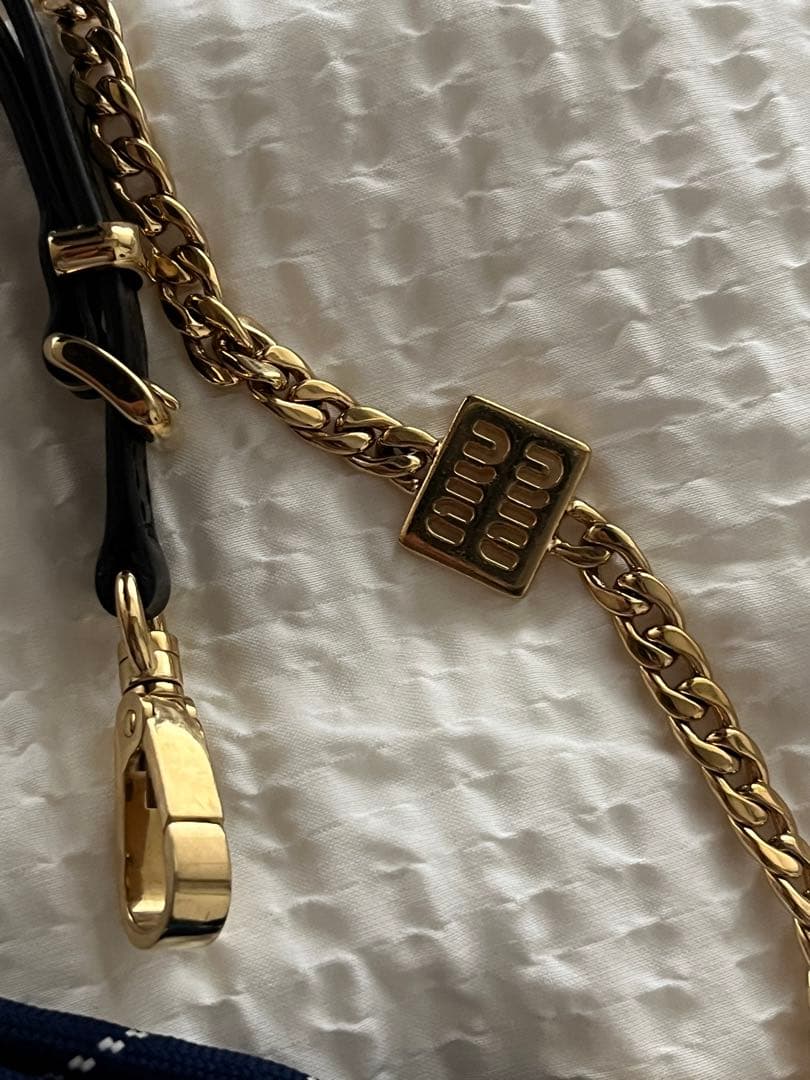 miumiuレザーxコードxメタル トリック バッグチャーム