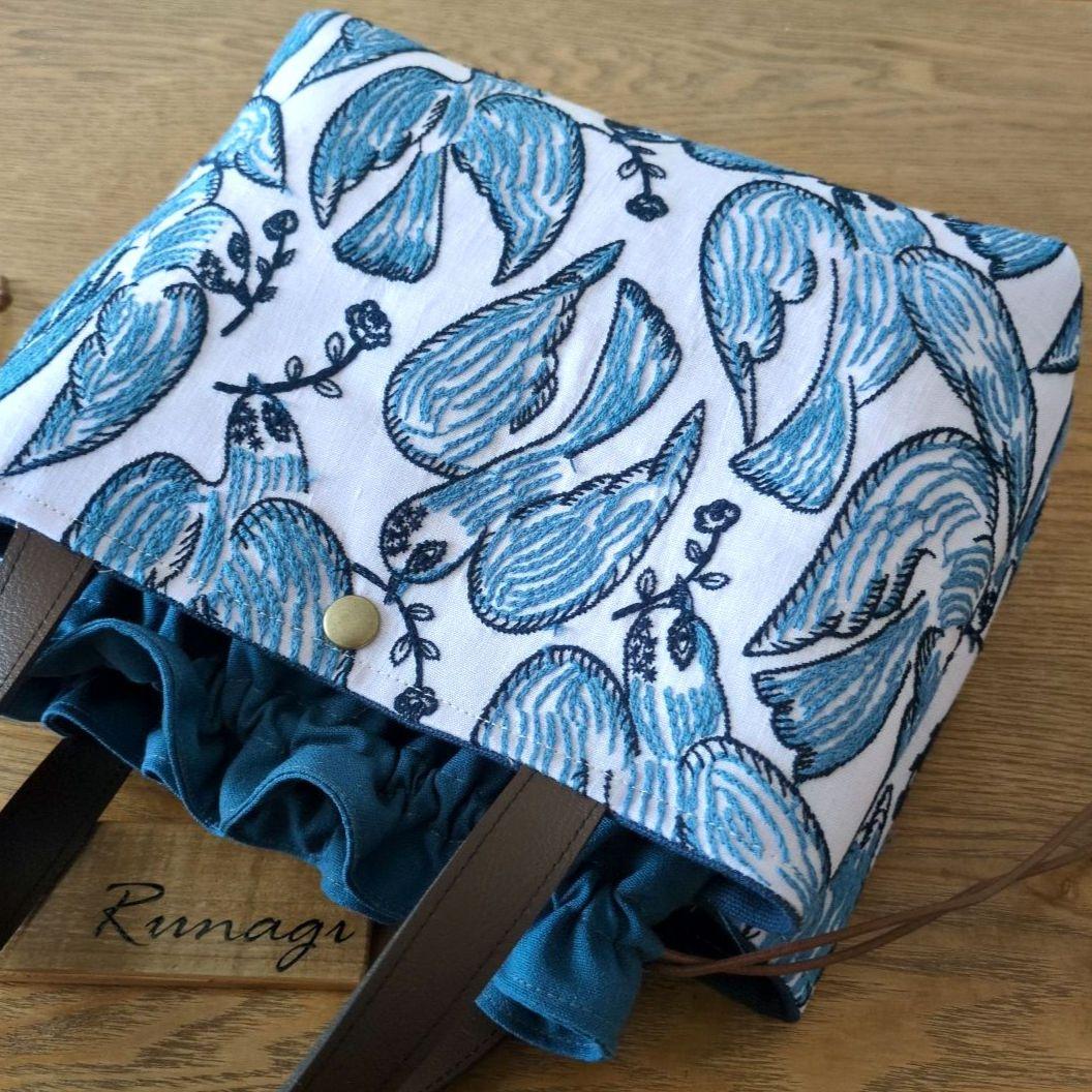 【1565】あおりポケットの巾着バッグ＊ミナペルホネン