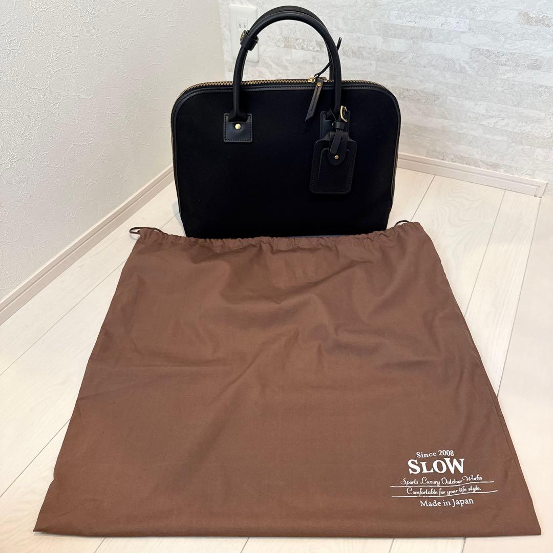 SLOW　TRADITIONAL コットンサージ/ラウンドブリーフケース