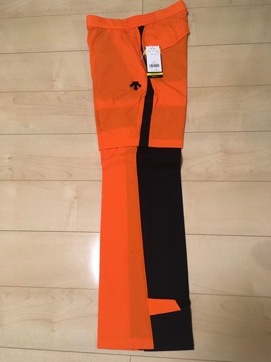 新品未使用　デサントのレインウェアセットアップ　オレンジ／黒　サイズO(TL)