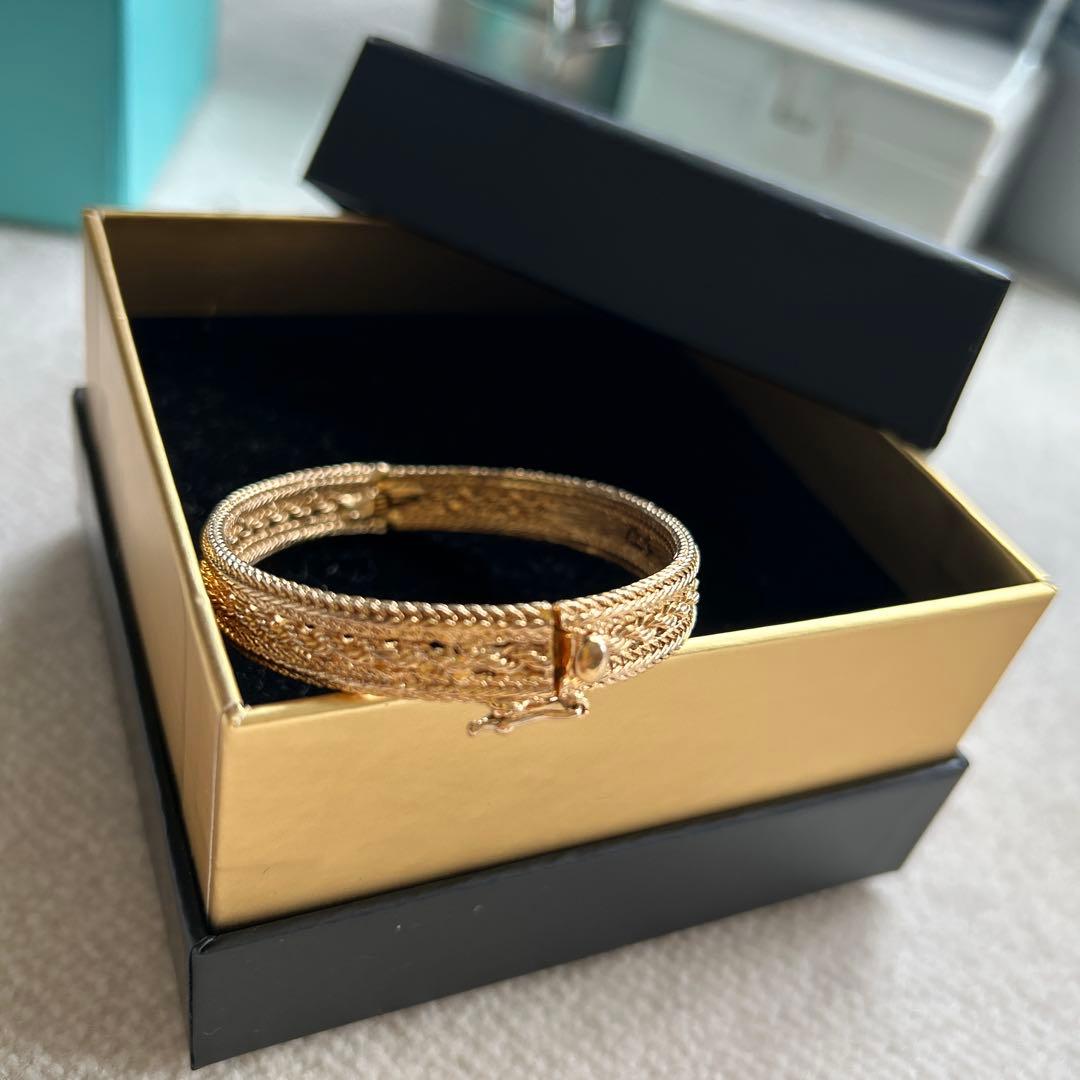 グロッセ　ゴールド 編み込みデザイン バングル