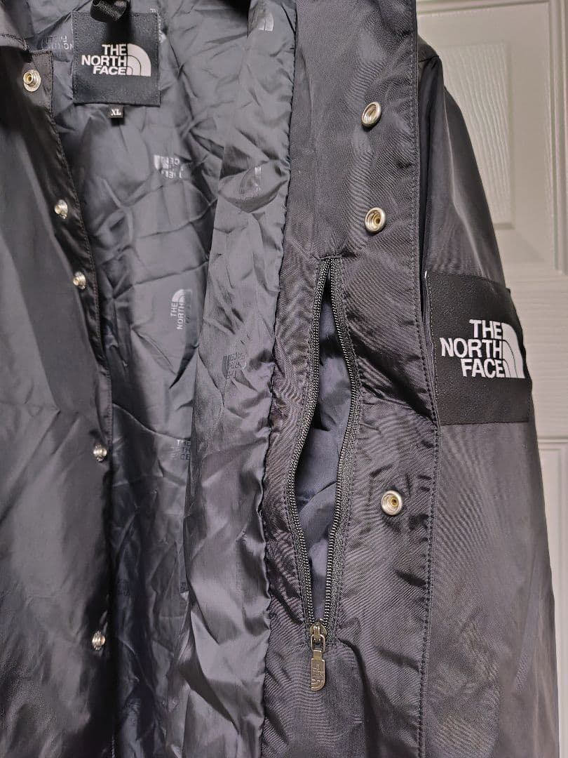 THE NORTH FACE ブラック ナイロンコーチジャケットNP21836