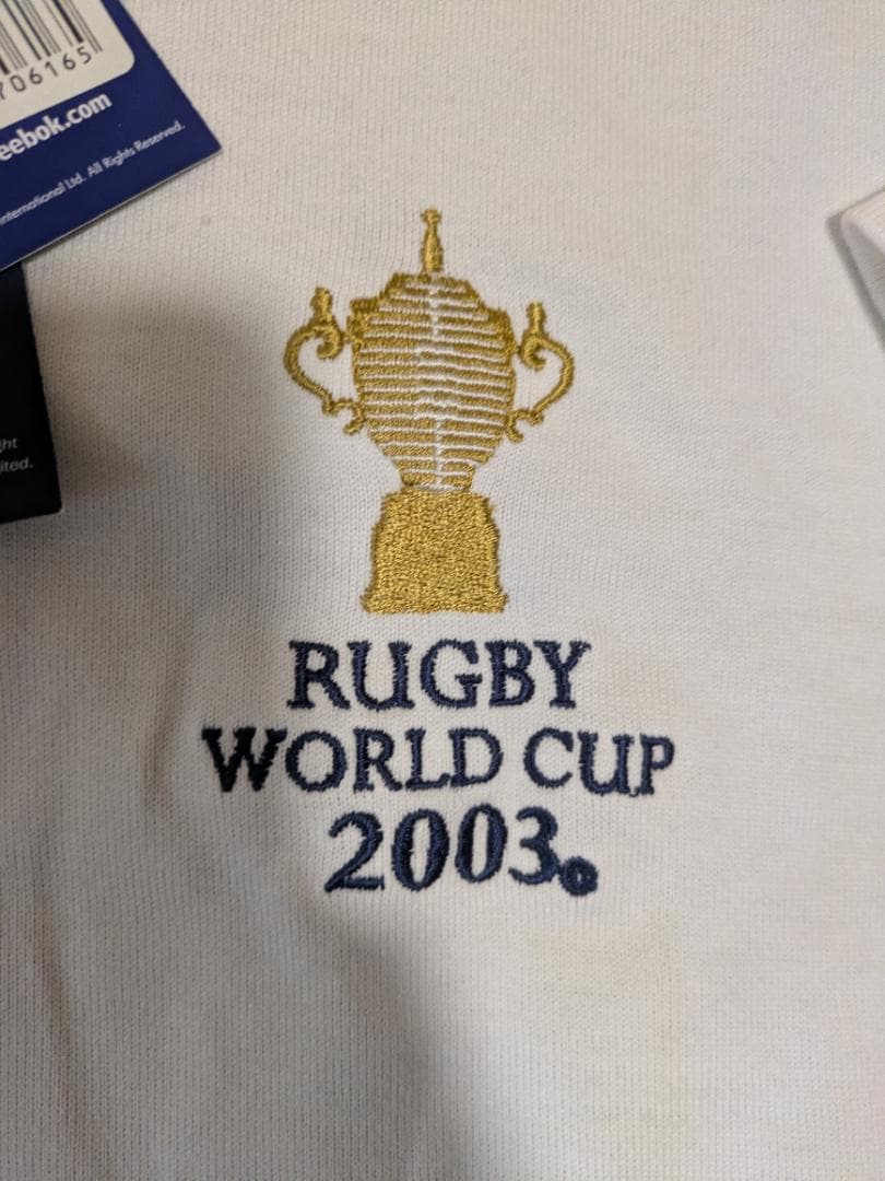 2003年のラグビーワールドカップ記念のポロシャツとマフラー