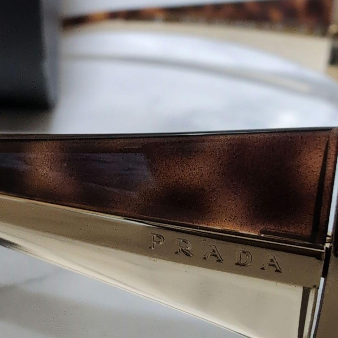 PRADA ゴールドカラーフレームメンズサングラス 度無し