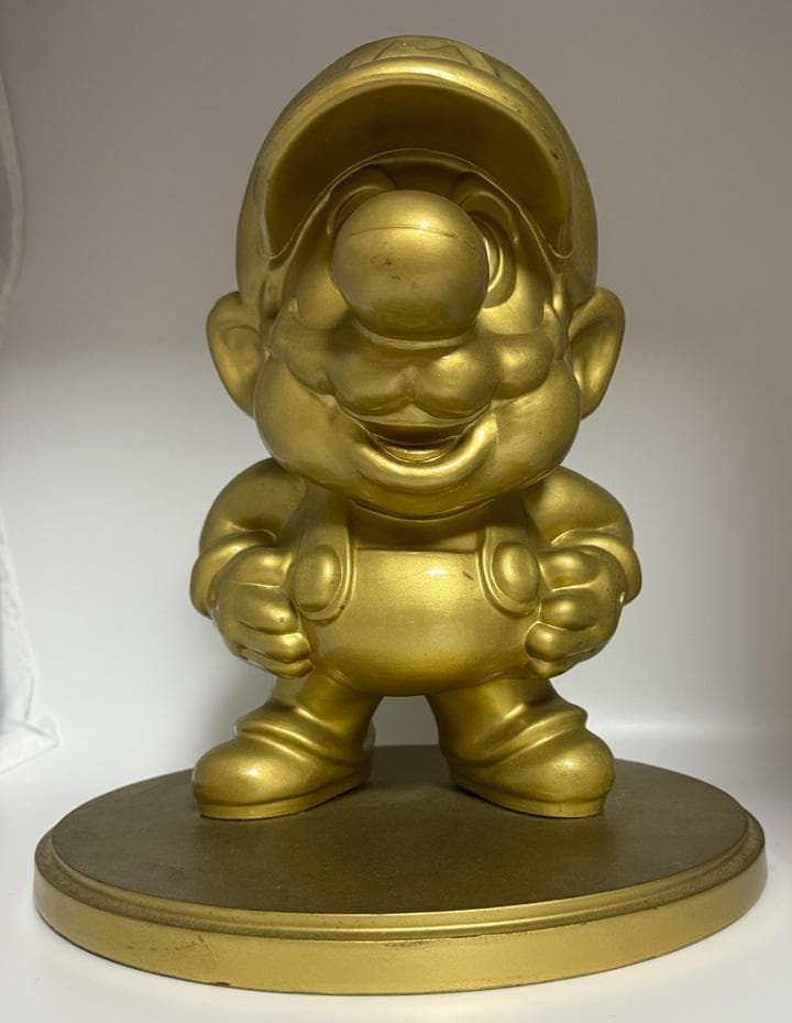 任天堂特約店 金のマリオ像・台座付き