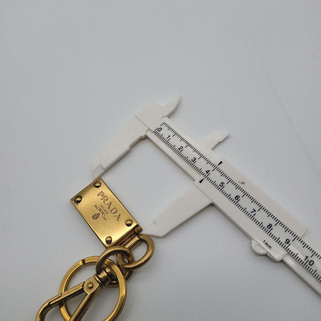 PRADAプラダ ロゴ プレート キーホルダー キーチャーム ゴールド