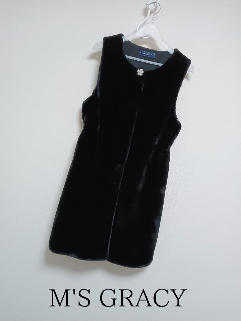 M'S GRACY フェイクファーロングジレ ベスト バックリボン