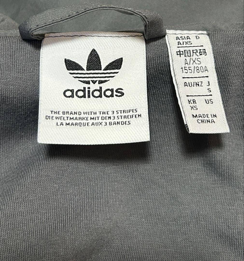 adidas ADILENIUM オーバーサイズ トラックトップ