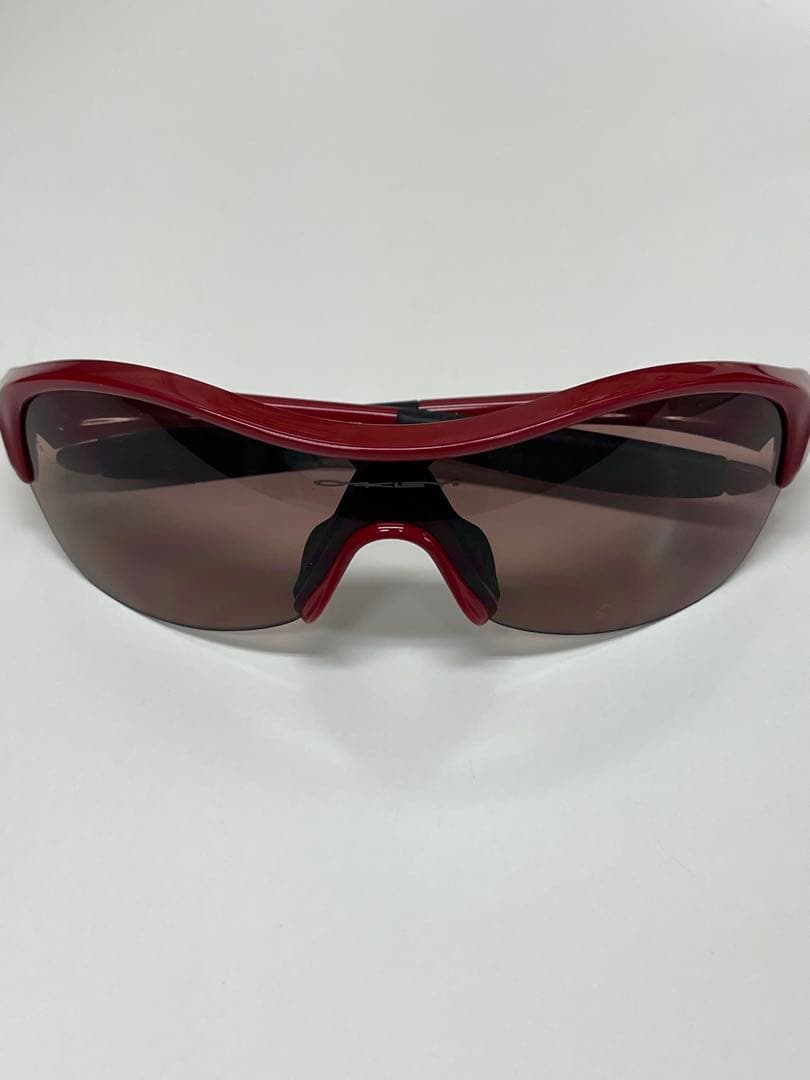 【3回使用程度】 OAKLEYオークリースポーツUVサングラス赤フレーム茶レンズ