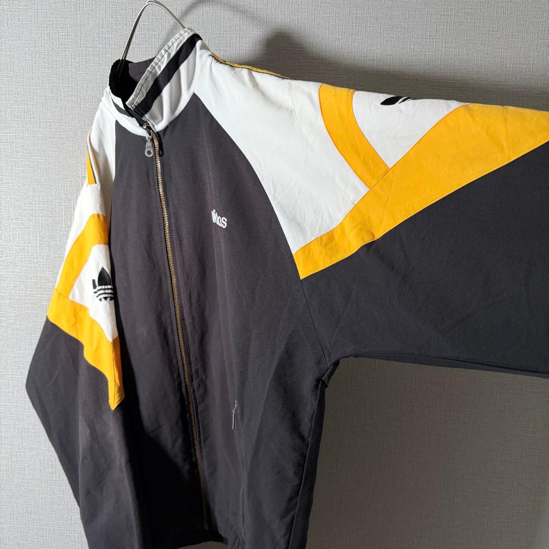 90s★adidas 万国旗タグ ナイロンジャケット 刺繍 アームロゴ L程度