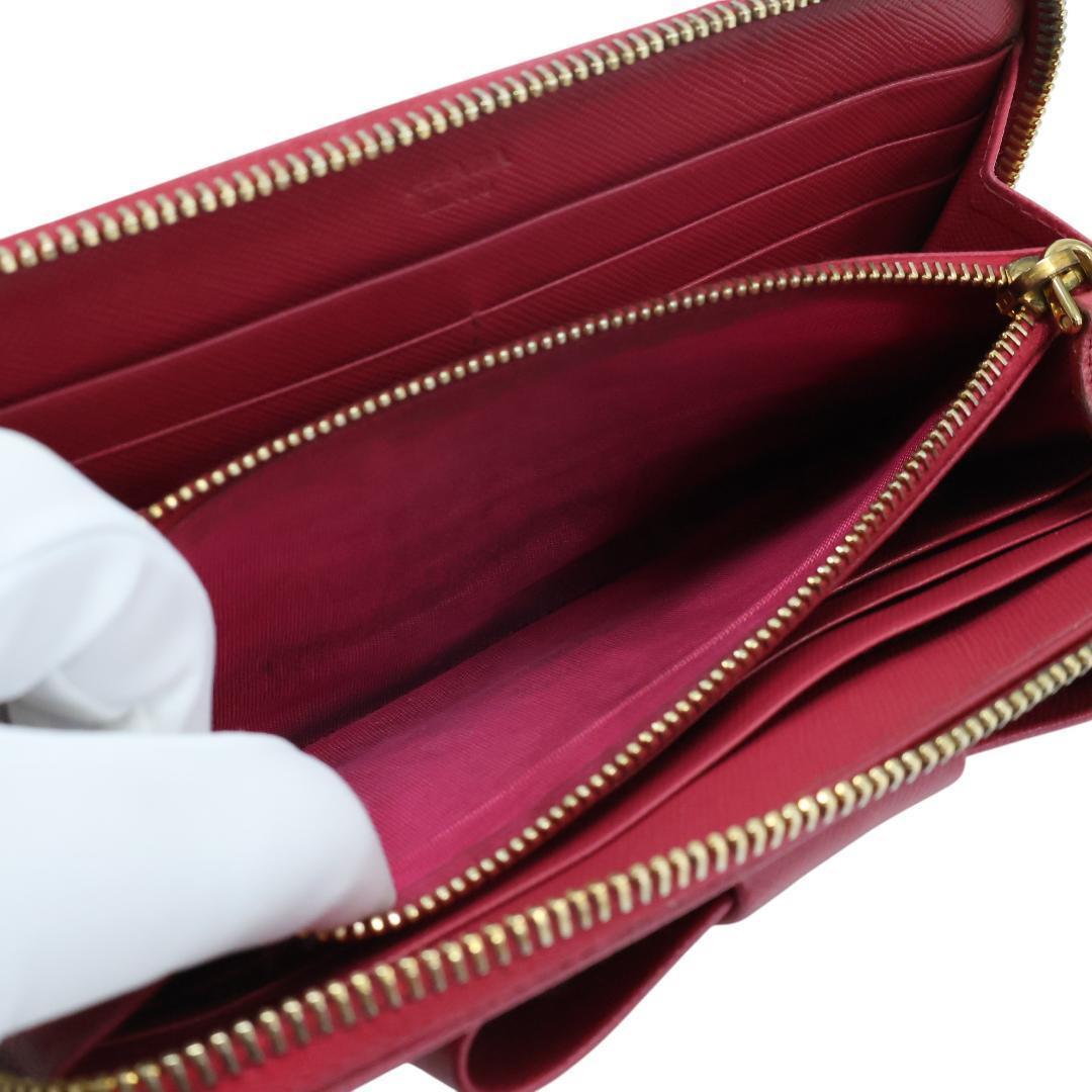 美品 PRADA プラダ 長財布 ラウンドファスナー リボン レザー ピンク
