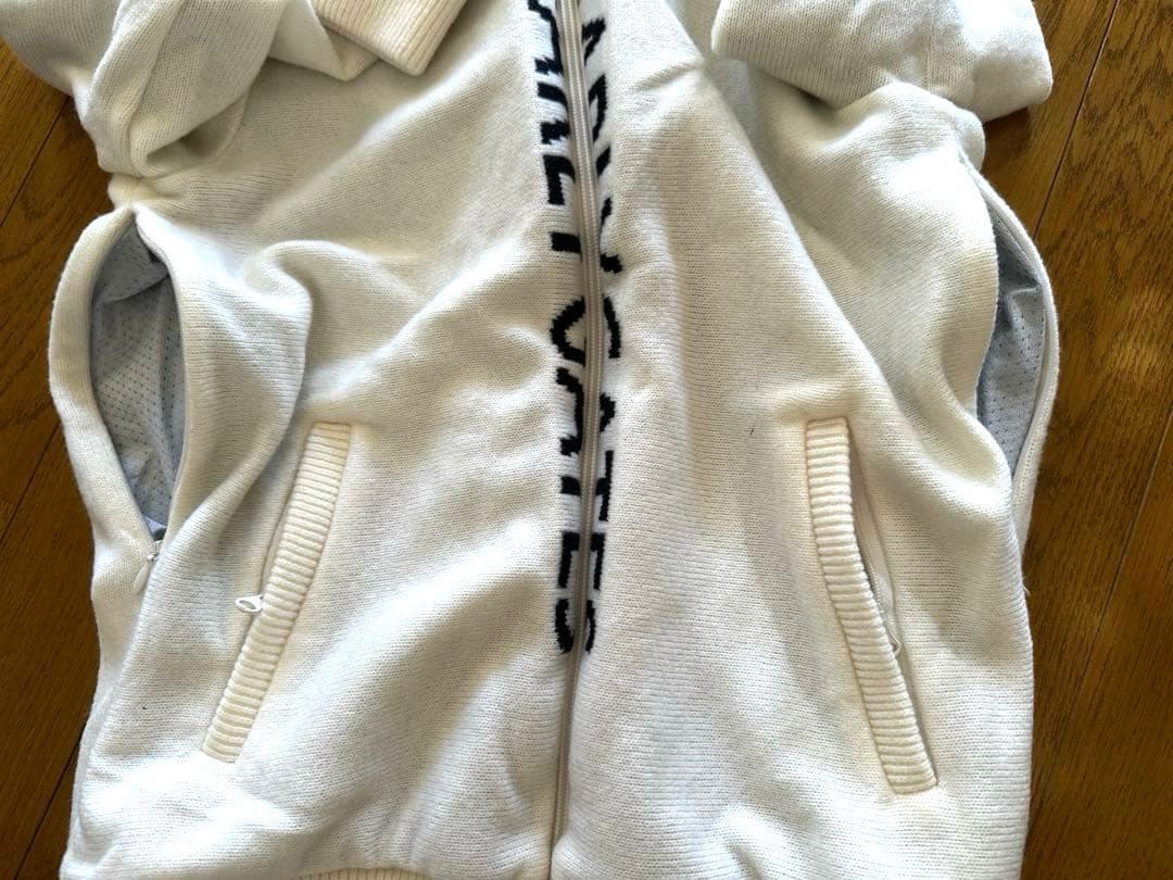 パーリーゲイツ ロゴ付きホワイトジップアップセーター