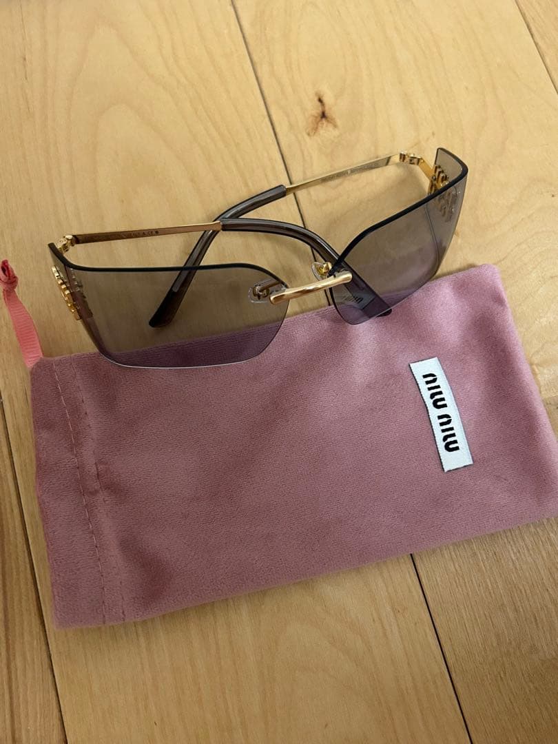miu miu フレームレスグレーサングラス