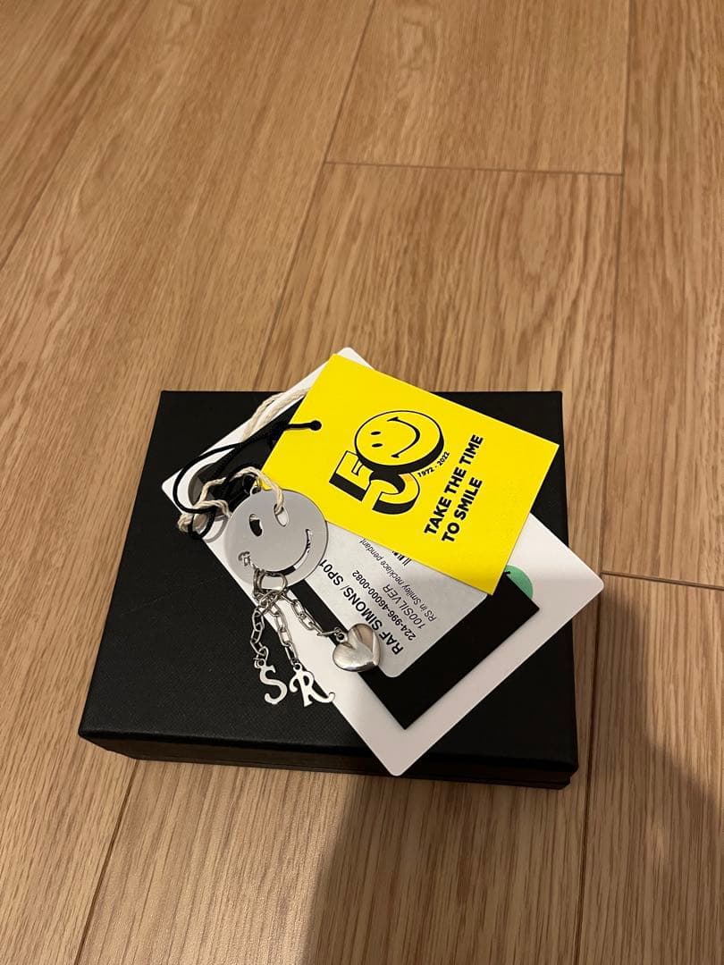 ラフシモンズ　スマイル　スマイリー　キーホルダー　新品未使用