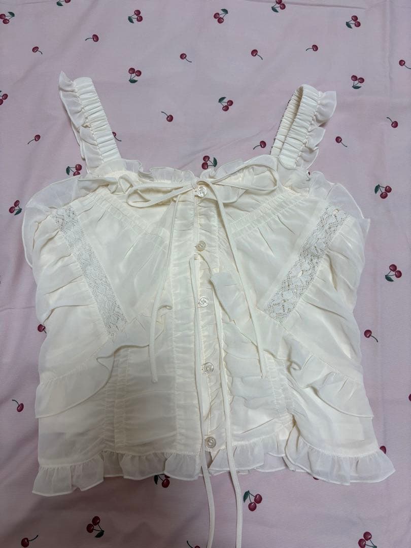 スライ　トップス