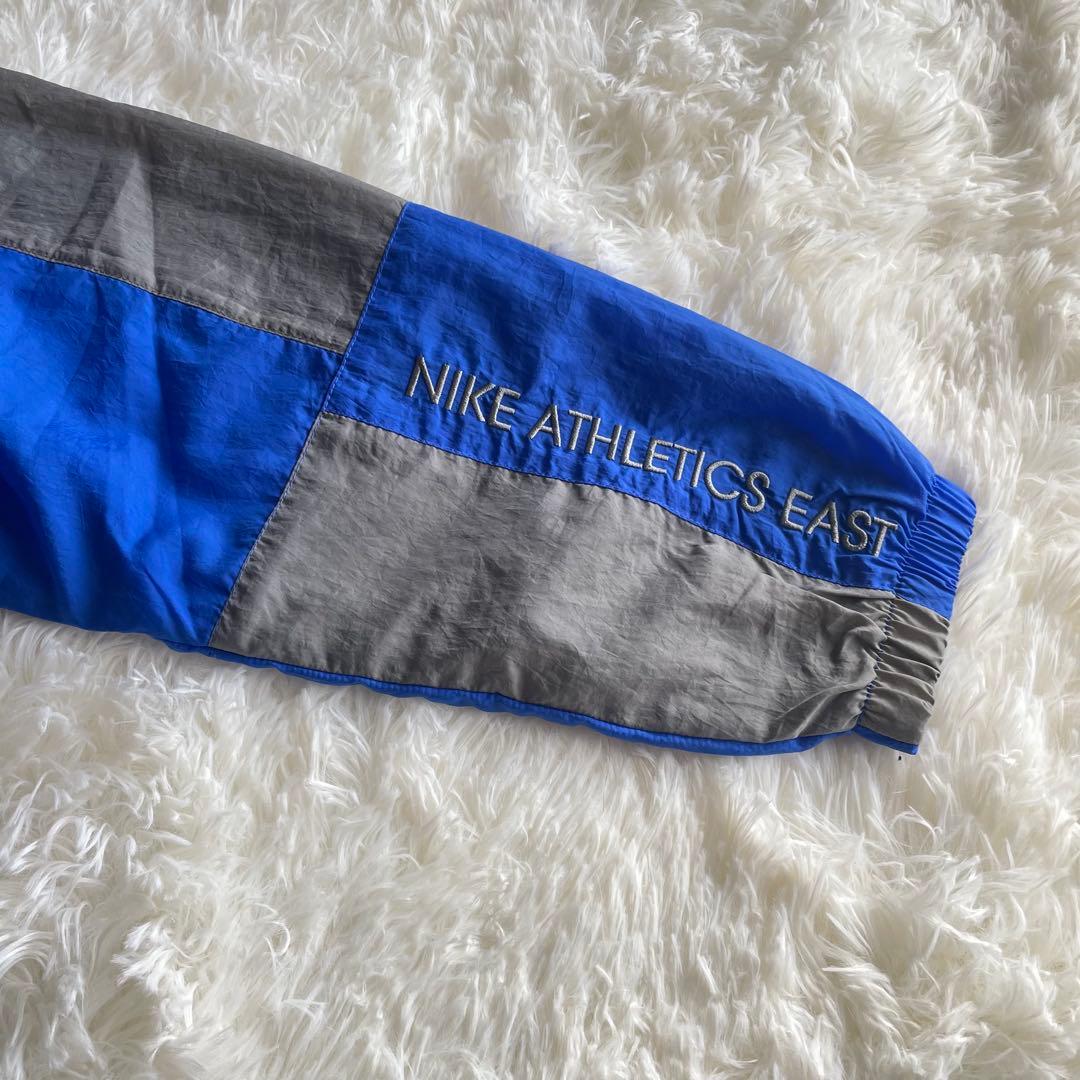 NIKE athletics East 青、グレーナイロンパーカー