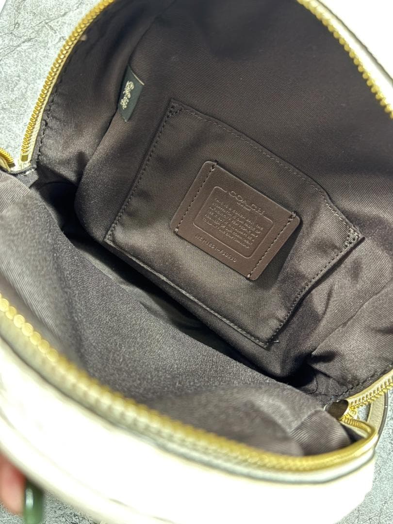 パパイヤ　COACH ホワイト バックパック