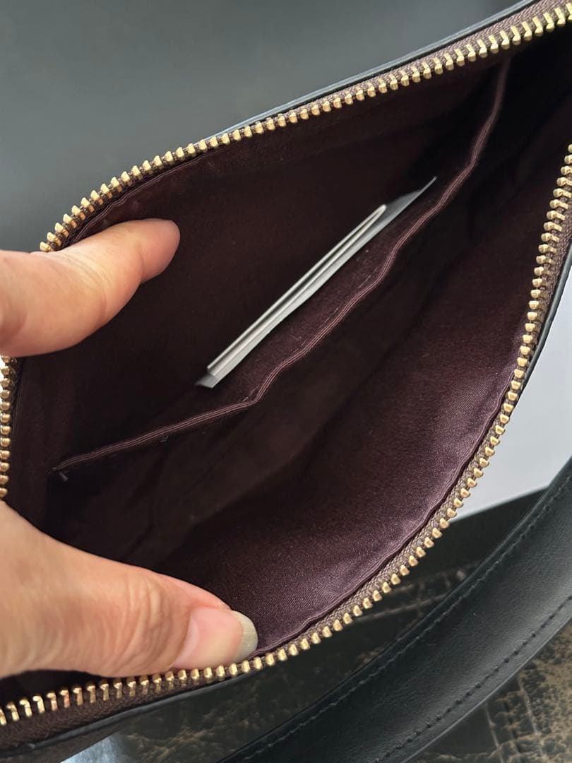 COACH ロゴ入りブラウンバッグ