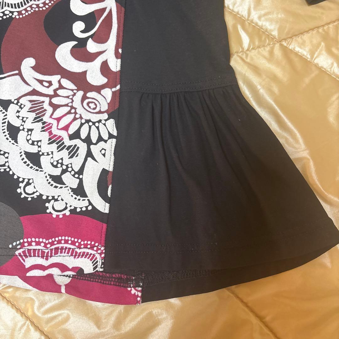 【美品】✨トクコプルミエヴォル✨黒地に抽象的な花柄の五分袖チュニック❣️