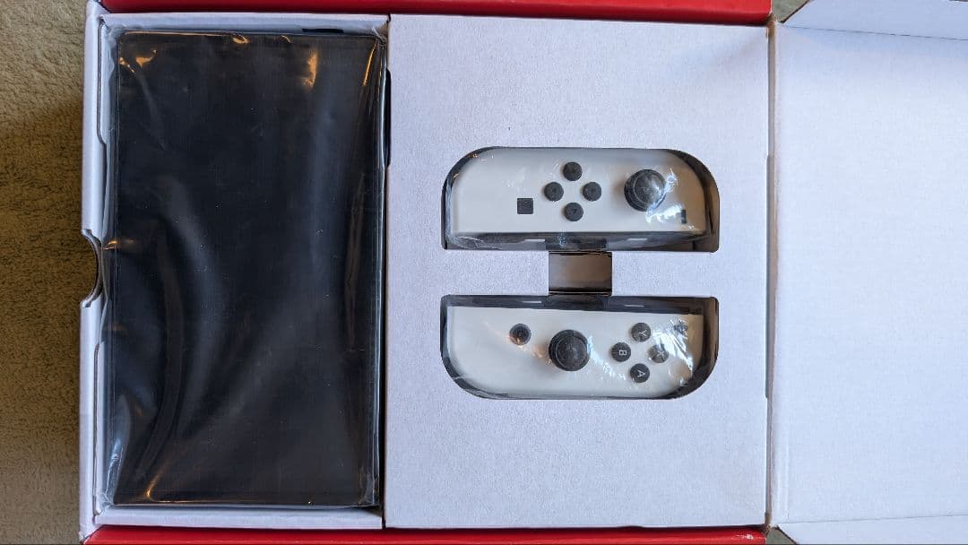 【新品未使用】Nintendo Switch 有機EL(画面に小さなキズあり)