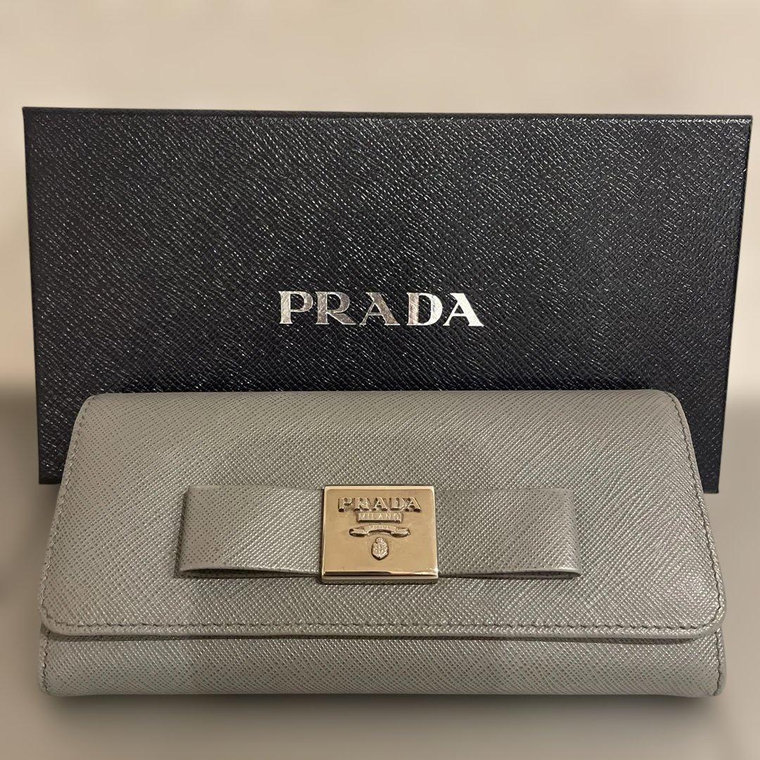◉PRADA プラダ　長財布 サフィアーノ　レザー リボン グレー